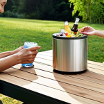 **"A high-tech, multifunctional outdoor table showcasing innovative features. It has a sleek, modern design with subtle glowing USB charging ports where a smartphone is plugged in, and a hidden storage compartment slightly ajar revealing neatly stored items. An integrated mini ice bucket is visible on the surface, chilling beverages. The table is set in a vibrant outdoor camping or barbecue scene with people happily interacting with it, emphasizing convenience and cutting-edge design under a clear sky."**